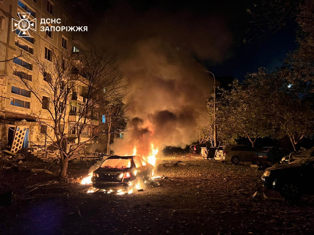 In this photo provided by the Ukrainian Emergency Service, fire and smoke raises after a residential building was damaged during Russia's air strike in Zaporizhzhia, Ukraine, Sunday, Oct. 5, 2025. (Ukrainian Emergency Service via AP)
