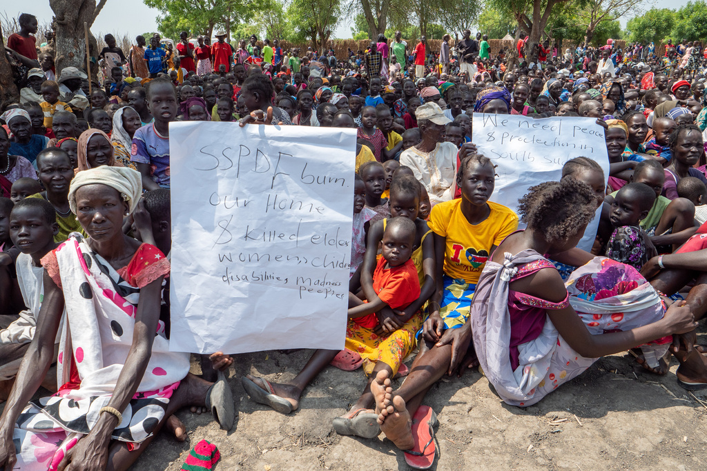 Internally displaced people gather at a church compound in Akobo, Jonglei state, South Sudan, Saturday, Feb. 21, 2026. (AP Photo/Florence Miettaux)