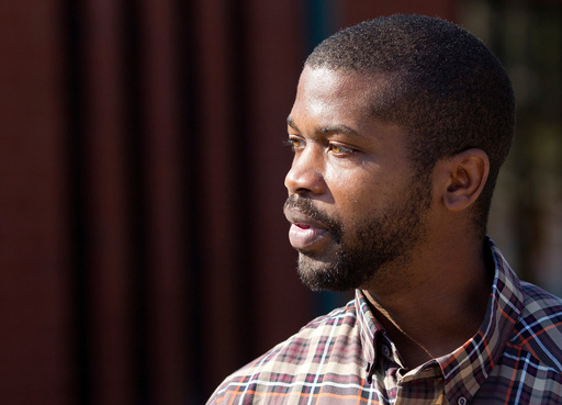 CORRECTS SOURCE TO NEWS&RECORD = N.C. House Rep. Cecil Brockman talks with early voters at Brown Recreation Center, on Wednesday, Nov. 2, 2016, in Greensboro, N.C. (Joseph Rodriguez/News & Record via AP) CORRECTS SOURCE TO NEWS&RECORD = N.C. House Rep. Cecil Brockman talks with early voters at Brown Recreation Center, on Wednesday, Nov. 2, 2016, in Greensboro, N.C. (Joseph Rodriguez/News & Record via AP)