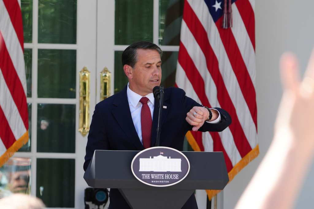 U.S. Attorney General Todd Blanche checks his watch as he speaks at a news briefing in the Rose Garden of the White House, Tuesday, Sept. 15, 2026, in Washington. (AP Photo/Jacquelyn Martin)