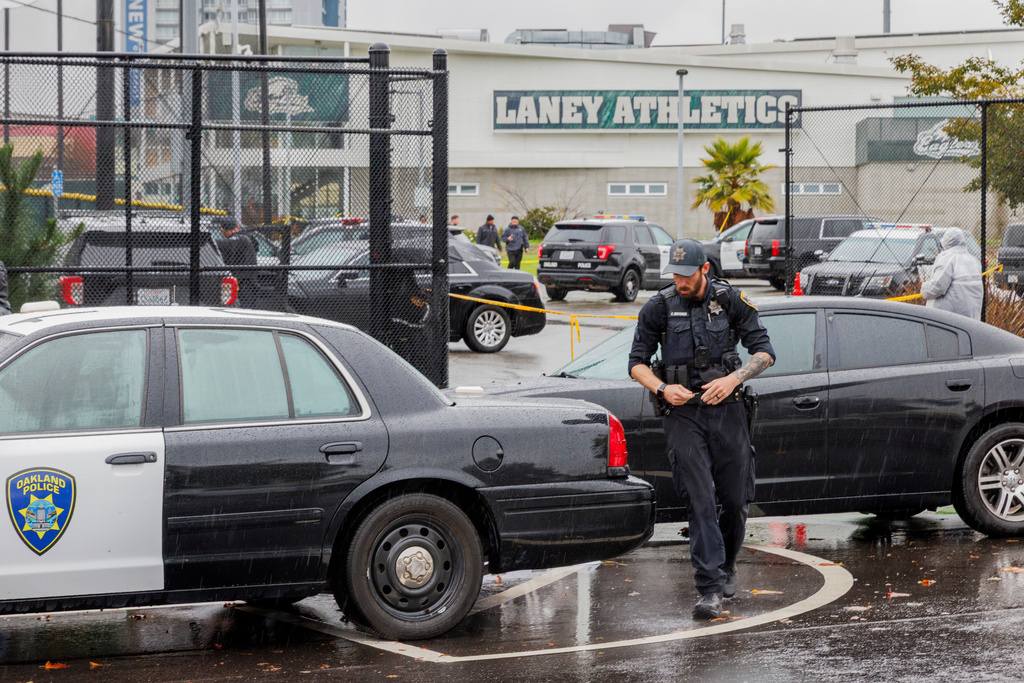 Police work the scene after a shooting at Laney College in Oakland, Calif., on Thursday, Nov. 13, 2025. (Santiago Mejia/San Francisco Chronicle via AP)
