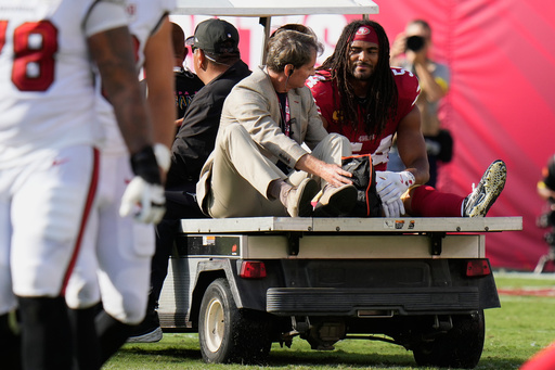 San Francisco 49ers middle linebacker Fred Warner, right, is carted off the field during the first half of an NFL football game against the Tampa Bay Buccaneers in Tampa, Fla., Sunday, Oct. 12, 2025. (AP Photo/Chris O'Meara) San Francisco 49ers middle linebacker Fred Warner, right, is carted off the field during the first half of an NFL football game against the Tampa Bay Buccaneers in Tampa, Fla., Sunday, Oct. 12, 2025. (AP Photo/Chris O'Meara)