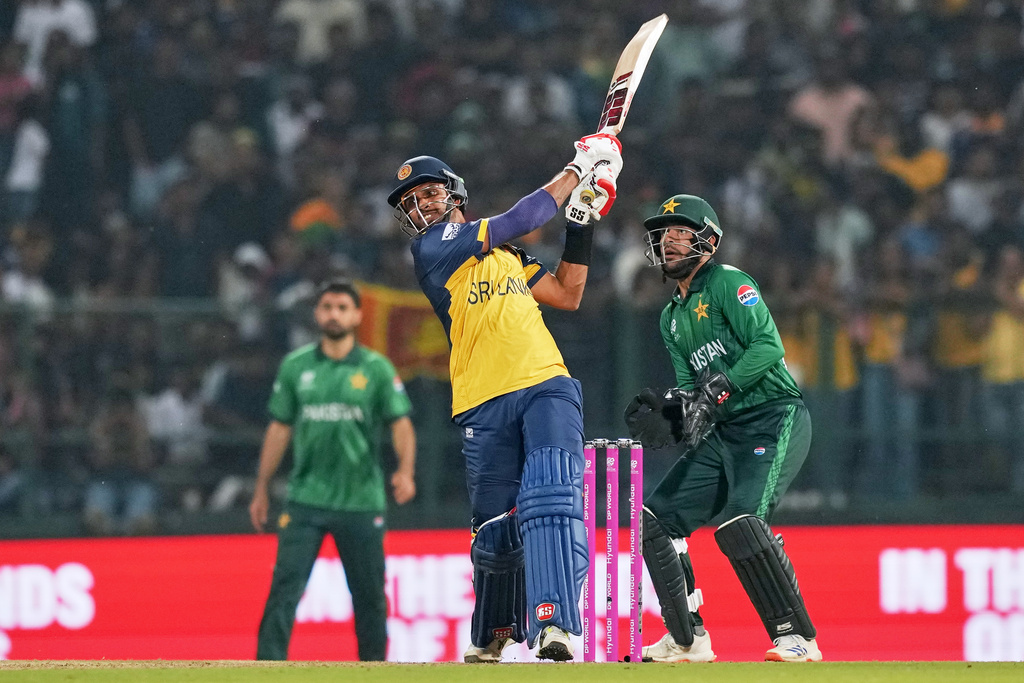 Sri Lanka's captain Dasun Shanaka plays a shot during the T20 World Cup cricket match between Pakistan and Sri Lanka in Pallekele, Sri Lanka, Saturday, Feb. 28, 2026. (AP Photo/Eranga Jayawardena)