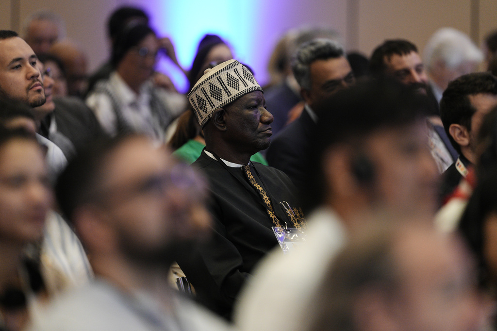 Attendees listen during a plenary session at a conference aimed at transitioning away from fossil fuels Tuesday, April 28, 2026, in Santa Marta, Colombia. (AP Photo/Ivan Valencia)