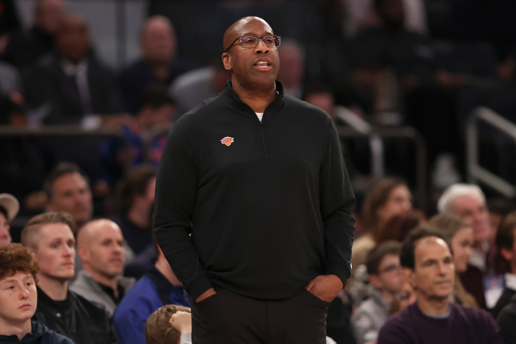 New York Knicks head coach Mike Brown stands on the court during the first half of an NBA basketball game against the Dallas Mavericks, Monday, Jan. 19, 2026, in New York. (AP Photo/Pamela Smith)