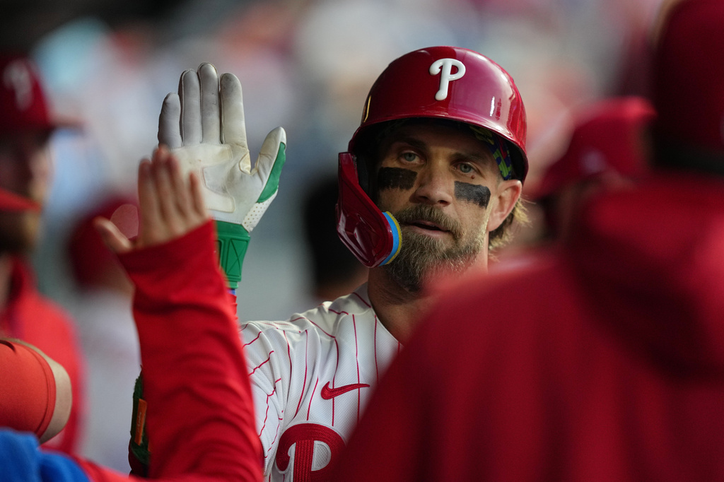 Philadelphia Phillies' Bryce Harper celebrates his home run off of Athletics pitcher Luis Severino during the third inning of a baseball game, Tuesday, May 5, 2026, in Philadelphia. (AP Photo/Matt Rourke)