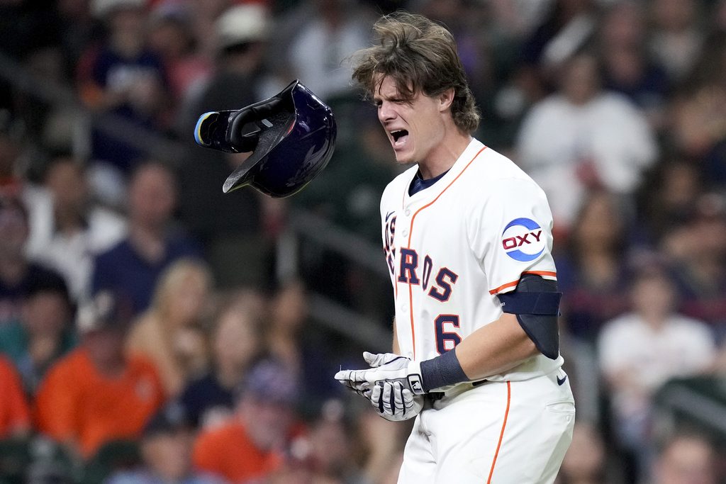 Houston Astros' Jake Meyers reacts after being hit by a pitch during the ninth inning of a baseball game against the Seattle Mariners, Saturday, Sept. 20, 2025, in Houston. (AP Photo/Eric Christian Smith)