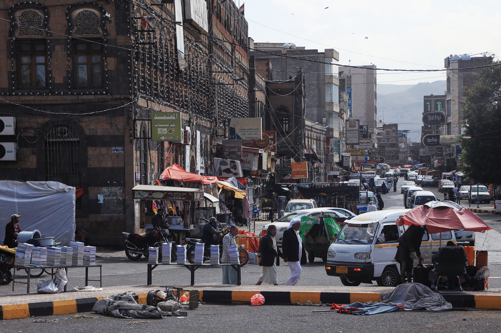 People walk at a street in Sanaa, Yemen, Tuesday, Sept. 8, 2026. (AP Photo/Osamah Abdulrahman)