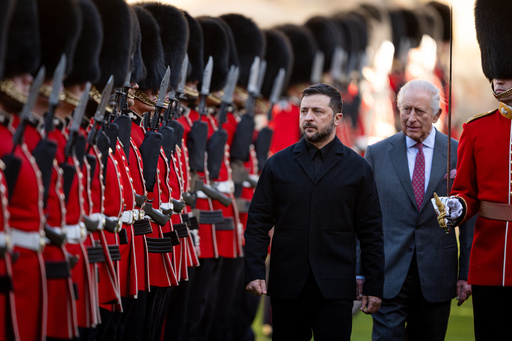 Centre from left: Ukraine's President Volodymyr Zelenskyy, King Charles III and Major Ben Tracey inspecting a guard of honour at Windsor Castle, England, Friday, Oct, 24, 2025. (Aaron Chown/Pool Photo via AP) Centre from left: Ukraine's President Volodymyr Zelenskyy, King Charles III and Major Ben Tracey inspecting a guard of honour at Windsor Castle, England, Friday, Oct, 24, 2025. (Aaron Chown/Pool Photo via AP)