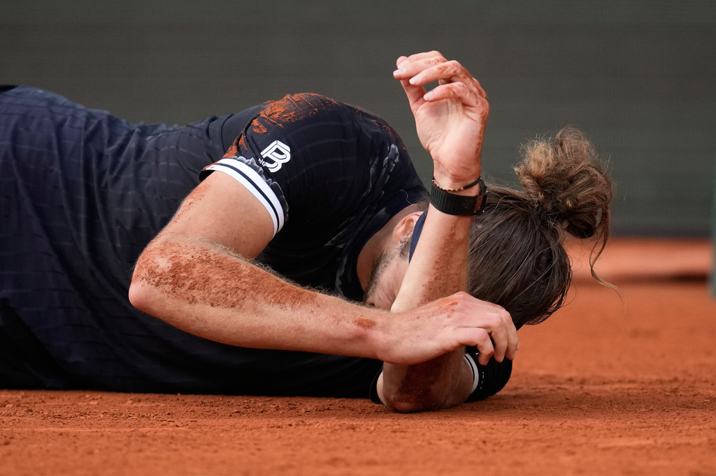 Alexander Zverev of Germany reacts after winning the men's final match against Flavio Cobolli of Italy at the French Open tennis tournament in Paris, Sunday, June 7, 2026. (AP Photo/Christophe Ena)