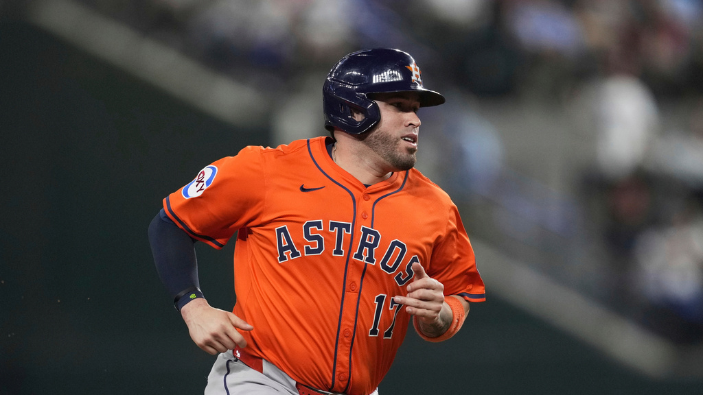 FILE - Houston Astros' Victor Caratini sprints to third during a baseball game against the Texas Rangers in Arlington, Texas., Sept. 6, 2025. (AP Photo/Tony Gutierrez, File)