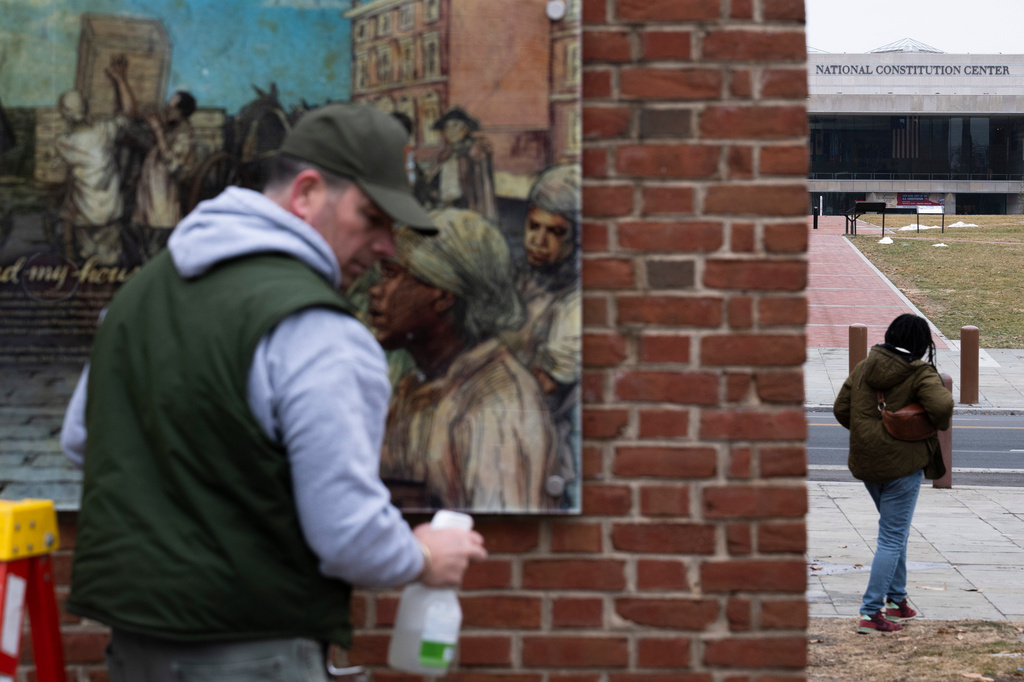 FILE - Panels that were part of an exhibit on slavery at the President's House Site in Independence National Historical Park are put back, Feb. 19, 2026, in Philadelphia. (AP Photo/Joe Lamberti, File)
