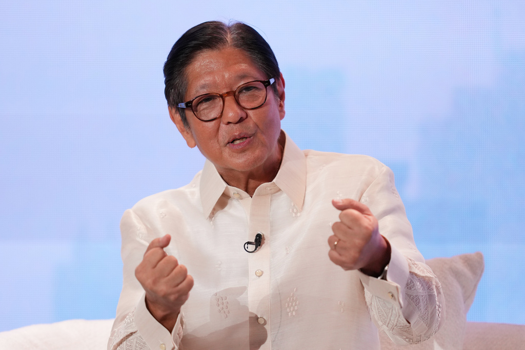 FILE - Philippine President Ferdinand Marcos Jr. gestures as he answers questions at the ASEAN Editors and Economic Opinon Leaders Forum in Makati, Philippines on Tuesday, Feb. 24, 2026. (AP Photo/Aaron Favila, File)