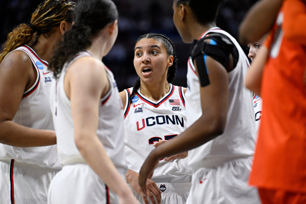 UConn guard Azzi Fudd, center, talks to teammates during the first half against Syracuse in the second round of the NCAA college basketball tournament Monday, March 23, 2026, in Storrs, Conn. (AP Photo/Jessica Hill)