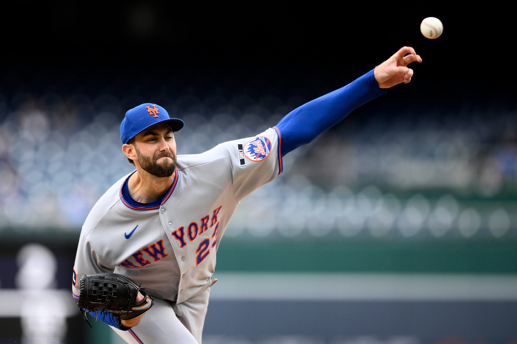 New York Mets pitcher David Peterson throws during the first inning of a baseball game against the Washington Nationals, Thursday, May 21, 2026, in Washington. (AP Photo/Nick Wass)