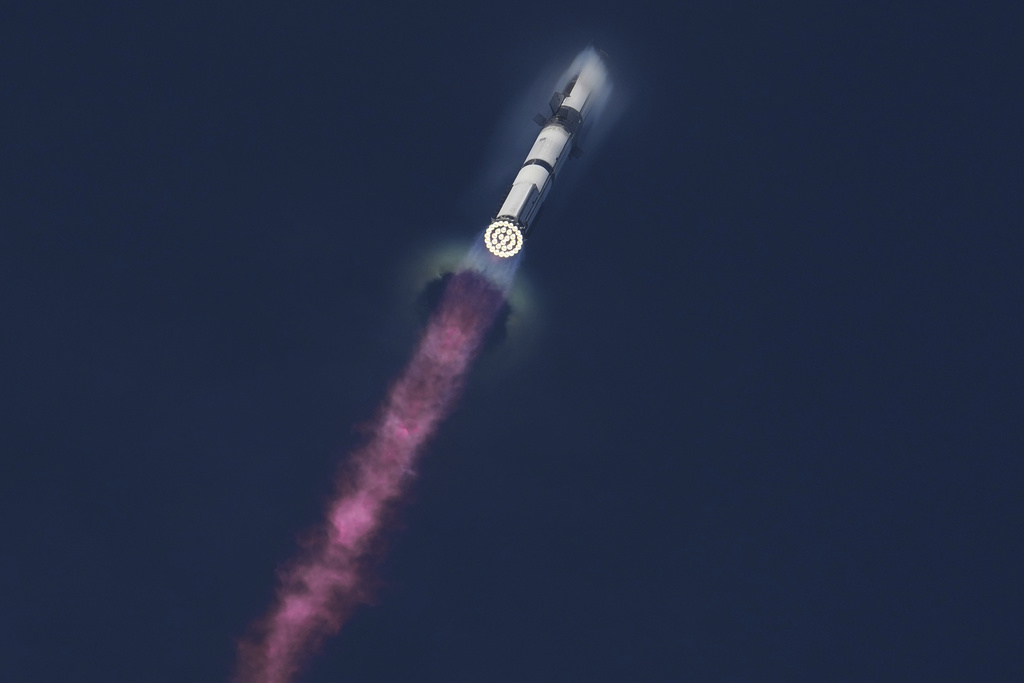 SpaceX's mega rocket Starship makes a test flight from Starbase, Texas, Tuesday, Aug. 26, 2025. (AP Photo/Eric Gay)