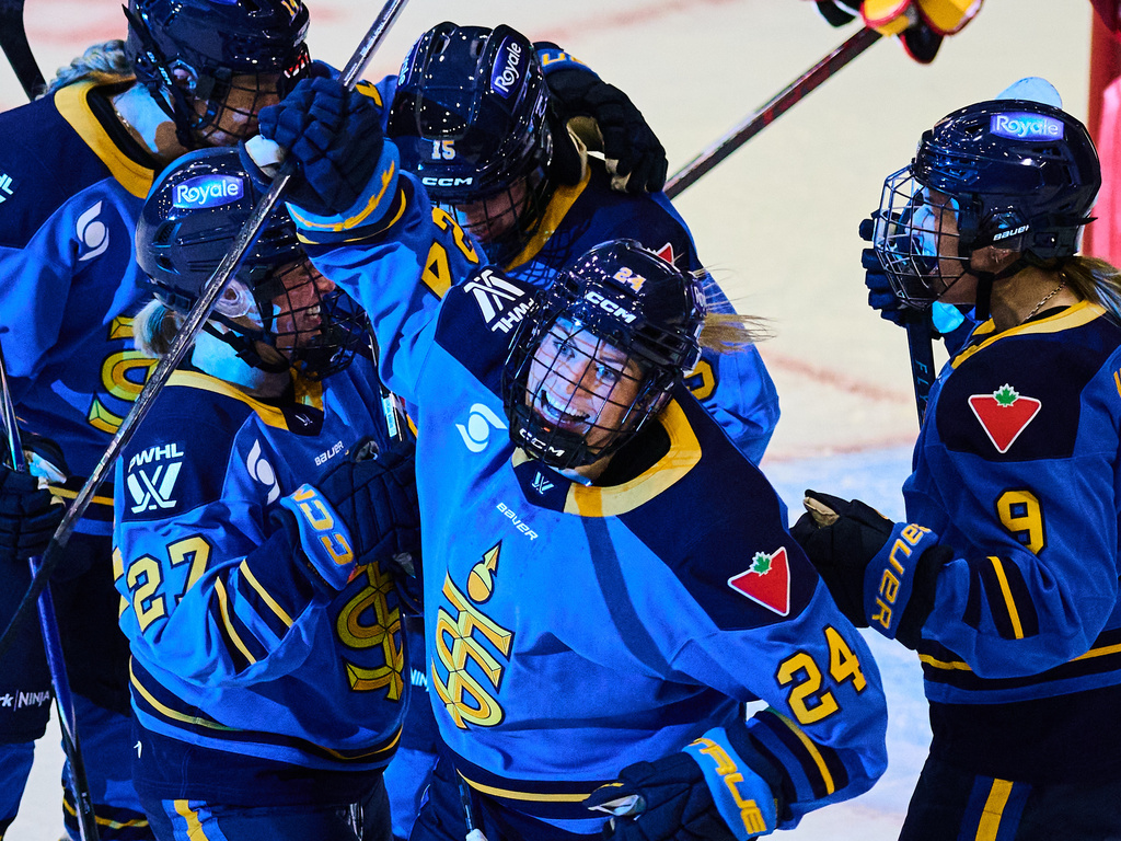Toronto Sceptres' Natalie Spooner (24) celebrates with her team after scoring against the Ottawa Charge during second period PWHL hockey action in Toronto, on Thursday, Dec. 4, 2025. (Sammy Kogan/The Canadian Press via AP)