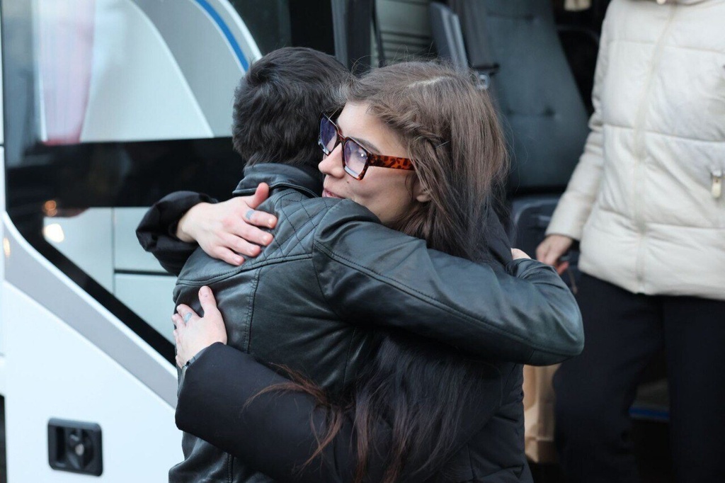 In this photo provided by the Press Service Of Coordination Headquarters for the Treatment of Prisoners of War on Saturday, Dec 13, 2025, Maria Kolesnikova, key Belorussian opposition figure, hugs a woman after been released from detention in Belarus, at the Ukrainian Belorussian border. (Press Service Of Coordination Headquarters for the Treatment of Prisoners of War via AP)