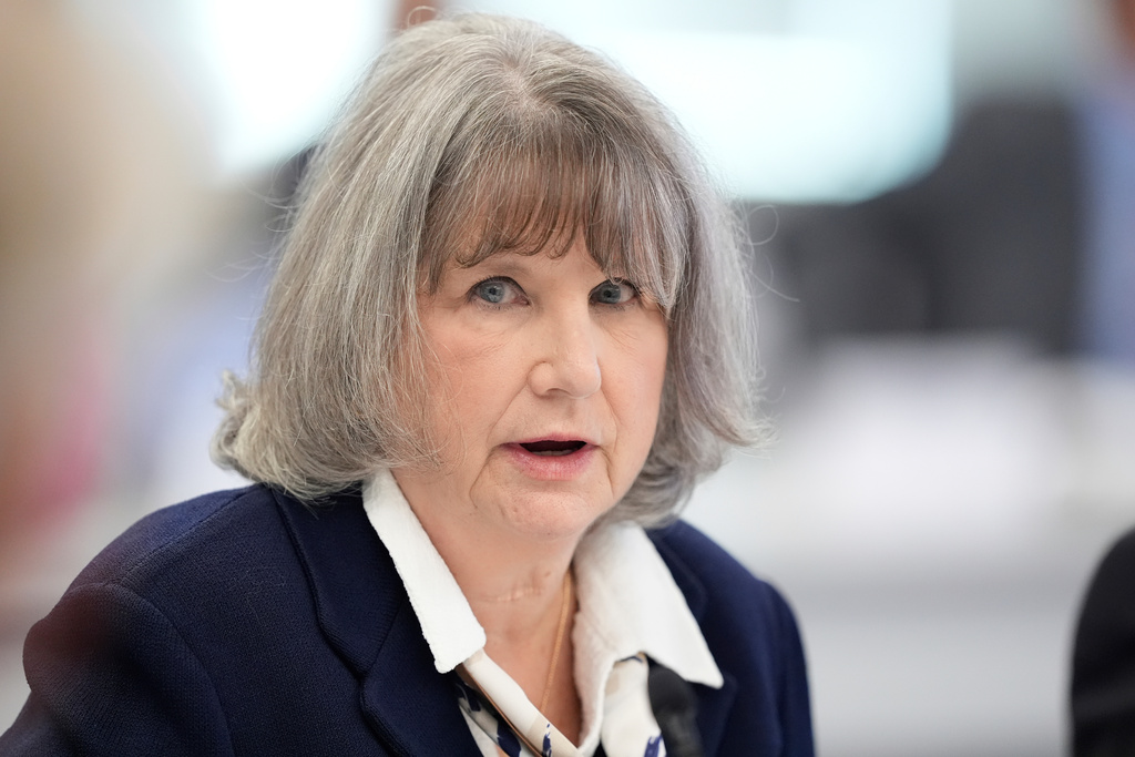 FILE - Committee member Vicky Pebsworth, speaks during a meeting of the Advisory Committee on Immunization Practices at the CDC, Sept. 18, 2025, in Chamblee, Ga. (AP Photo/Brynn Anderson, File)
