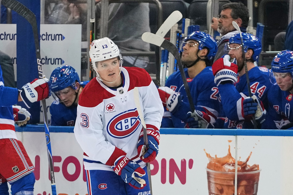 Montréal Canadiens' Cole Caufield (13) reacts after scoring a goal during the second period of an NHL hockey game against the New York Rangers Thursday, April 2, 2026, in New York. (AP Photo/Frank Franklin II)