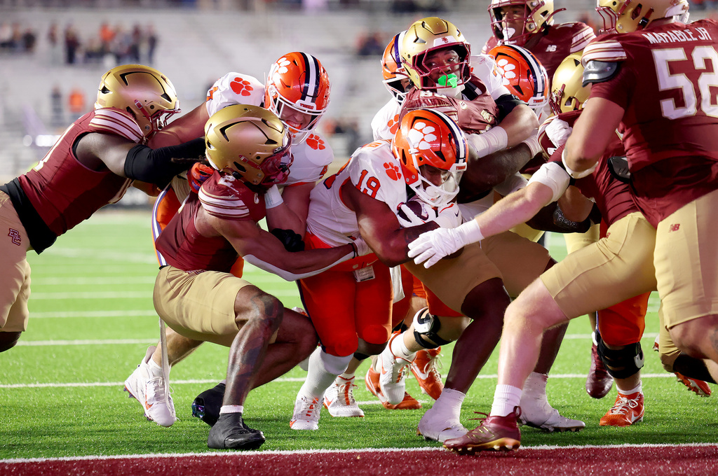 Clemson running back Keith Adams Jr. (19) crosses the goal line to score during the second half of an NCAA college football game against Boston College, Saturday, Oct. 11, 2025 in Boston. (AP Photo/Mark Stockwell)