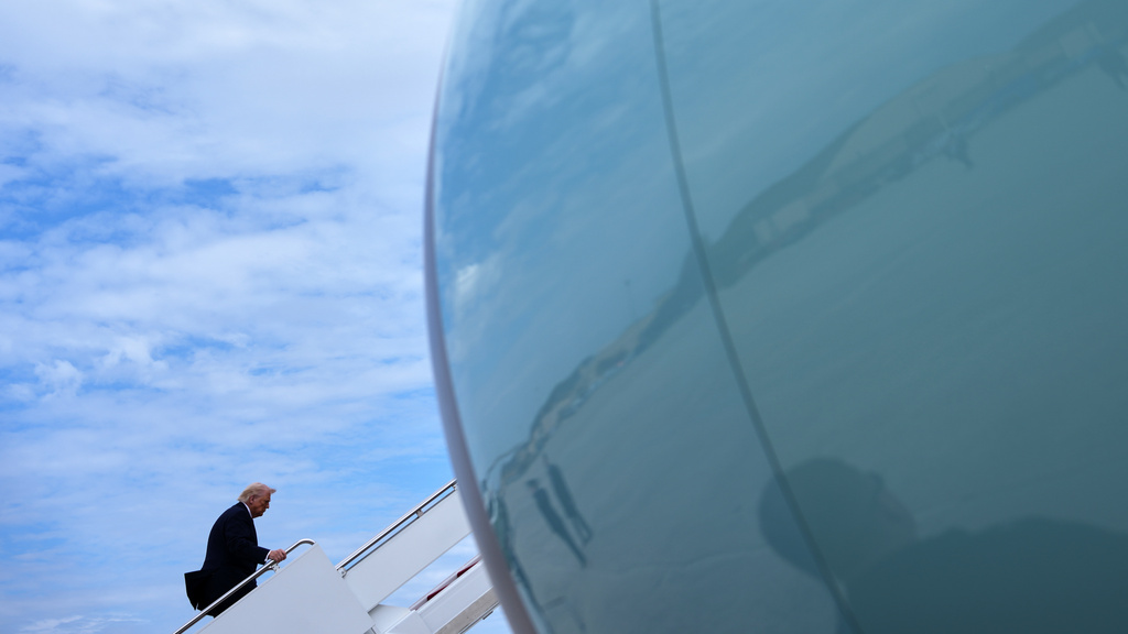 President Donald Trump boards Air Force One, Wednesday, March 11, 2026, at Joint Base Andrews, Md. (AP Photo/Julia Demaree Nikhinson)