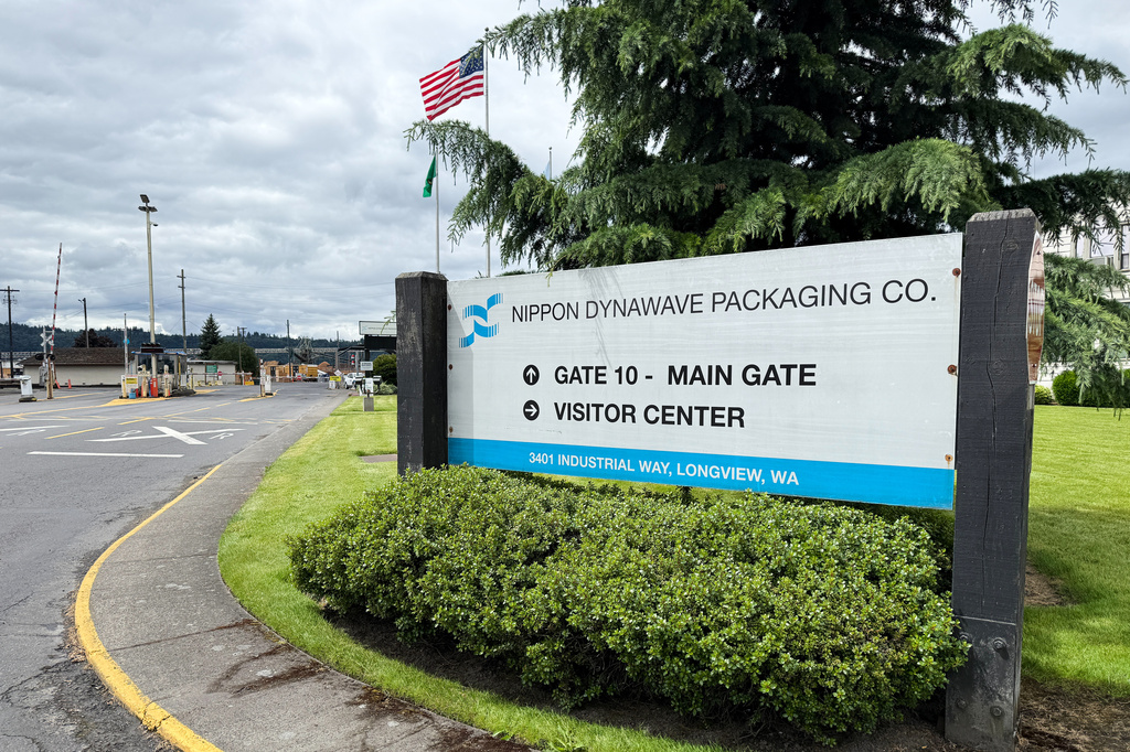 The exterior of the Nippon Dynawave Packaging Co. is shown, after a tank containing hazardous liquid imploded, on Tuesday, May 26, 2026 in Longview, Wash. (AP Photo/Claire Rush)
