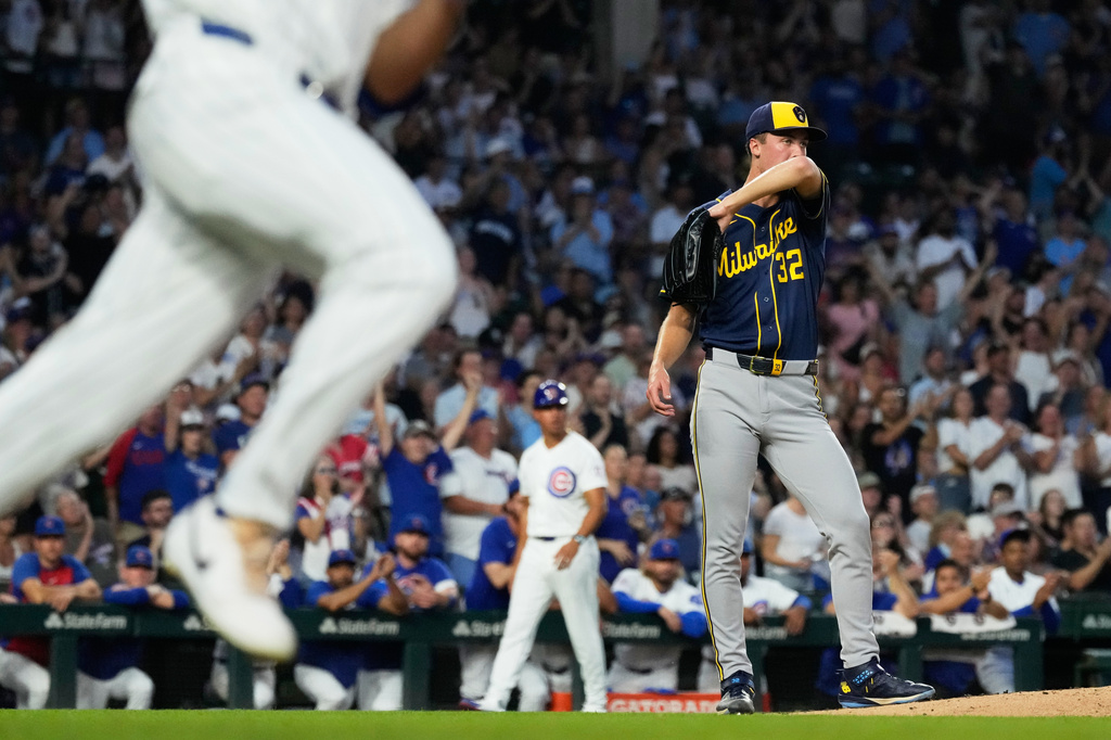 Milwaukee Brewers starting pitcher Jacob Misiorowski wipes his face after Chicago Cubs' Tyrone Taylor hits a one-run single during the second inning of a baseball game in Chicago, Wednesday, Sept. 2, 2026. (AP Photo/Nam Y. Huh)