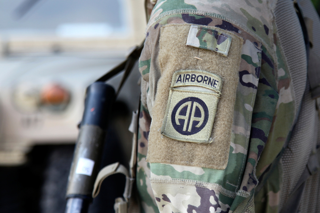 FILE - An 82nd Airborne Division paratrooper participates in artillery training during a field exercise at Fort Bragg, N.C., on Aug. 26, 2020. (AP Photo/Sarah Blake Morgan, File)