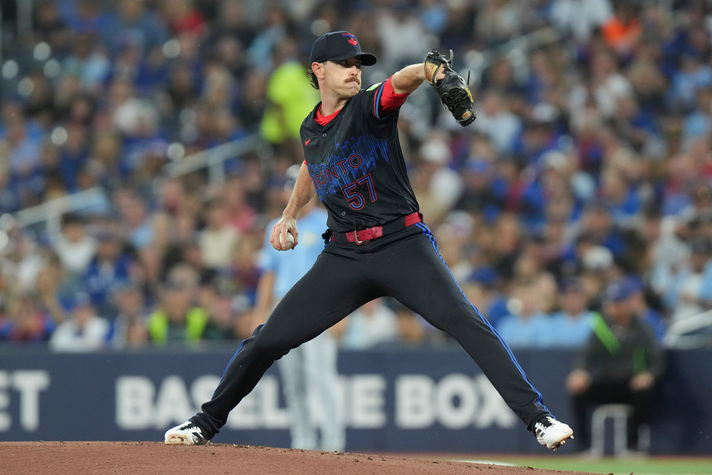 Toronto Blue Jays pitcher Shane Bieber (57) works against the Tampa Bay Rays during first inning MLB baseball action in Toronto on Friday, Sept. 26, 2025. (Chris Young/The Canadian Press via AP)