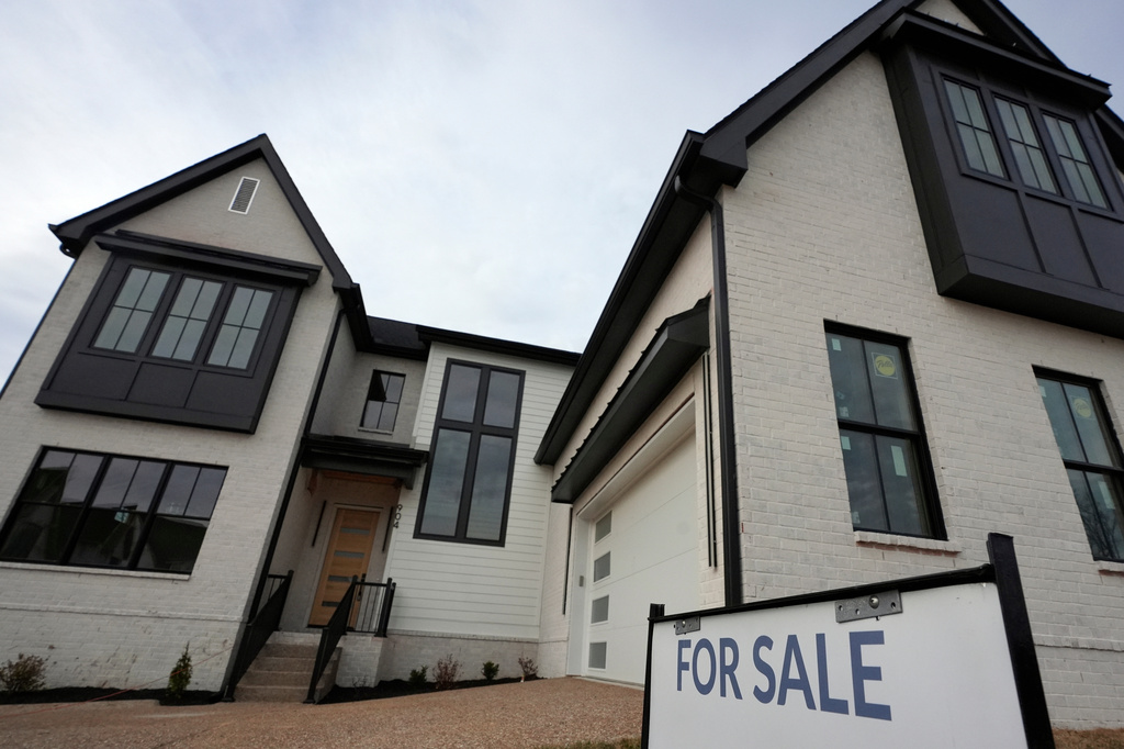 FILE - A for sale sign is posted outside a home, Feb. 10, 2026, in Nashville, Tenn. (AP Photo/George Walker IV, file)