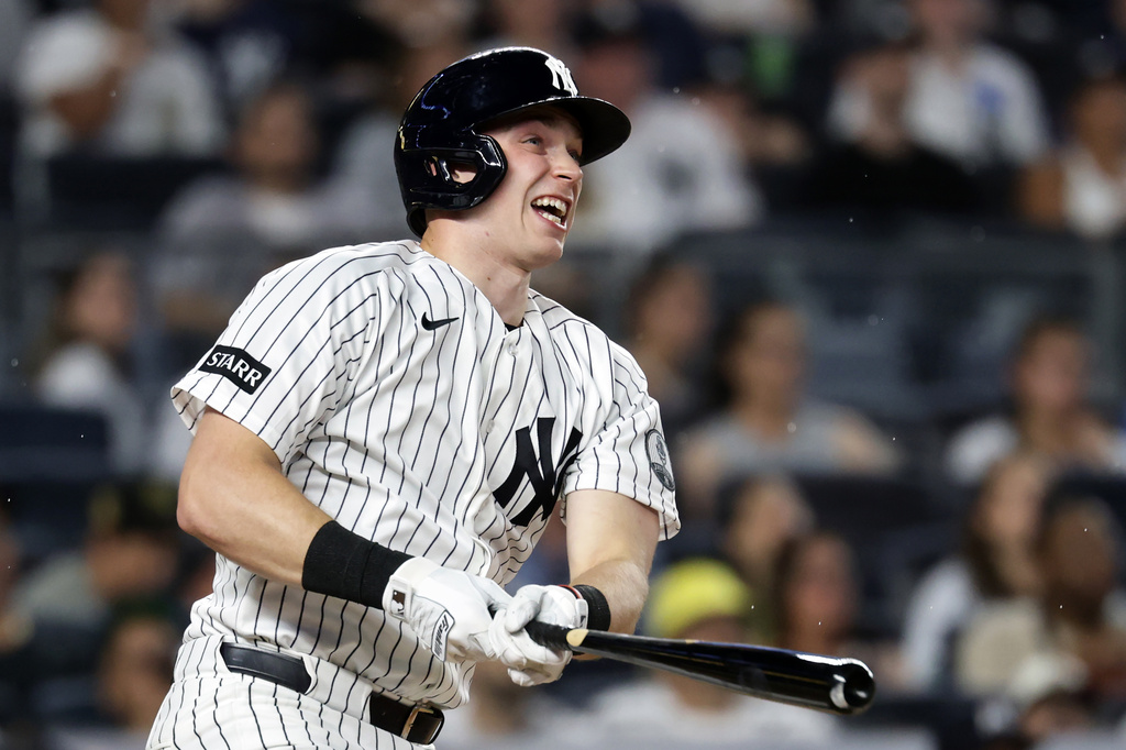New York Yankees' Ben Rice watches his two-run home run during the third inning of a baseball game against the Minnesota Twins, Friday, July 3, 2026, in New York. (AP Photo/Adam Hunger)