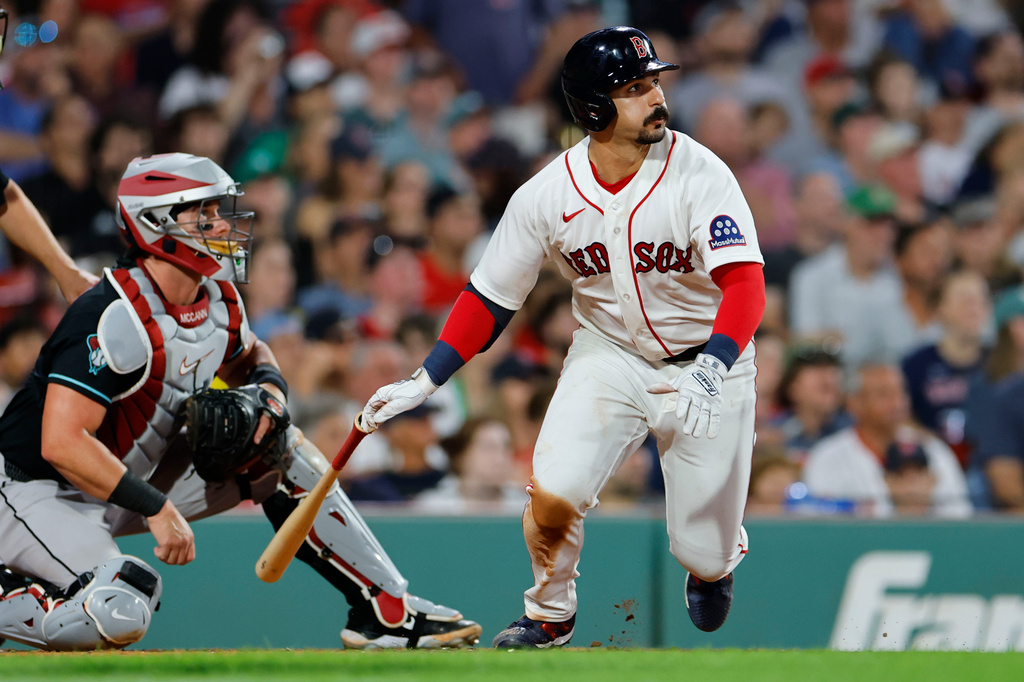 Arizona Diamondbacks catcher James McCann, left, and Boston Red Sox designated hitter Mickey Gasper, watch Gasper's solo home run during the sixth inning of a baseball game Tuesday, Aug. 18, 2026, in Boston. (AP Photo/CJ Gunther)