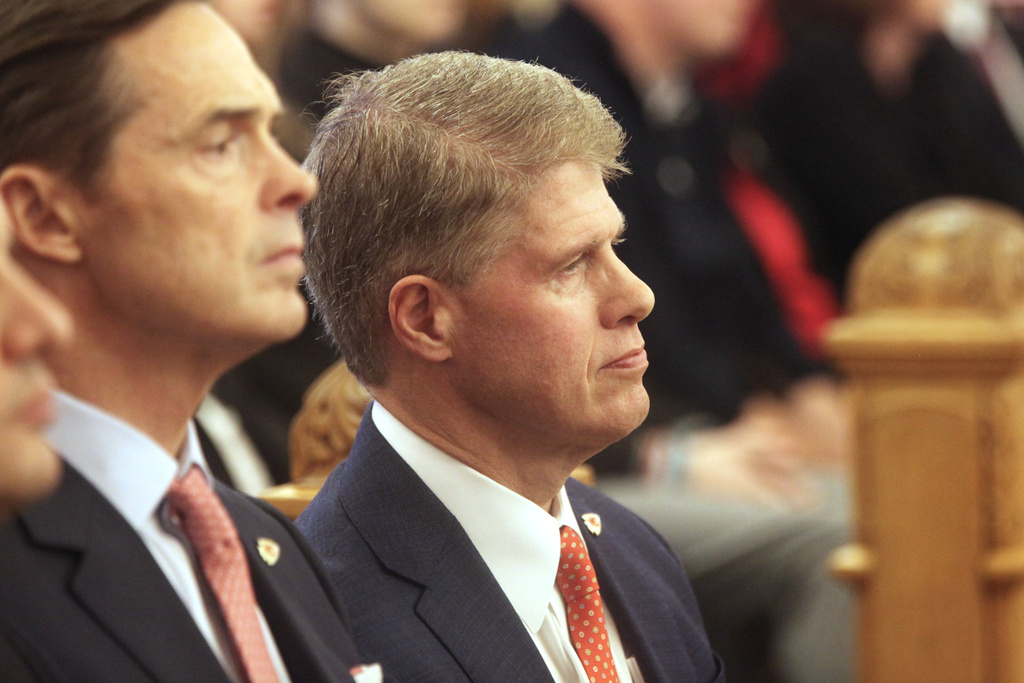 Kansas City Chiefs Chairman and CEO Clark Hunt watches the start of a meeting of legislative leaders who had the power to decide whether the state issues bonds to help the Chiefs finance a new stadium on the Kansas side of the Kansas City metropolitan area, Monday, Dec. 22, 2025, at the Statehouse in Topeka, Kan. (AP Photo/John Hanna)