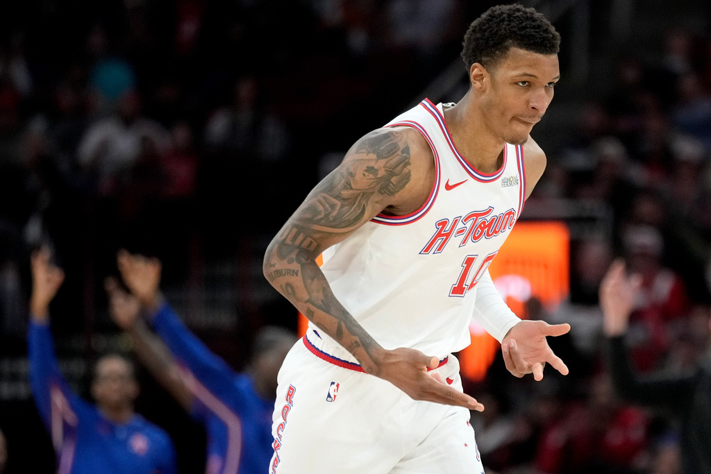 Houston Rockets forward Jabari Smith Jr. reacts after making a three point basket against the Dallas Mavericks during the first half of an NBA basketball game Saturday, Jan. 31, 2026, in Houston. (AP Photo/Eric Christian Smith)