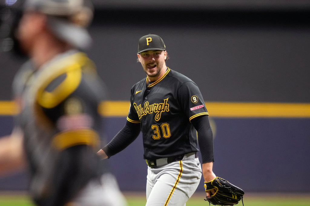 Pittsburgh Pirates pitcher Paul Skenes reacts to striking out Milwaukee Brewers' Garrett Mitchell during the fifth inning of a baseball game against the Milwaukee Brewers, Friday, April 24, 2026, in Milwaukee. (AP Photo/Kayla Wolf)