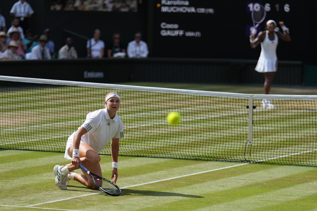 Karolina Muchova of the Czech Republic looks at the ball as Coco Gauff celebrates saving a match point against her in their semifinal women's singles match at the Wimbledon Tennis Championships in London, Thursday, July 9, 2026. (AP Photo/Kirsty Wigglesworth)