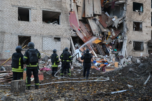 Rescuers attend to the scene after a Russian missile hit a hostel in Zaporizhzhia, Ukraine, Thursday, Oct. 30, 2025. (AP Photo/Kateryna Klochko) Rescuers attend to the scene after a Russian missile hit a hostel in Zaporizhzhia, Ukraine, Thursday, Oct. 30, 2025. (AP Photo/Kateryna Klochko)
