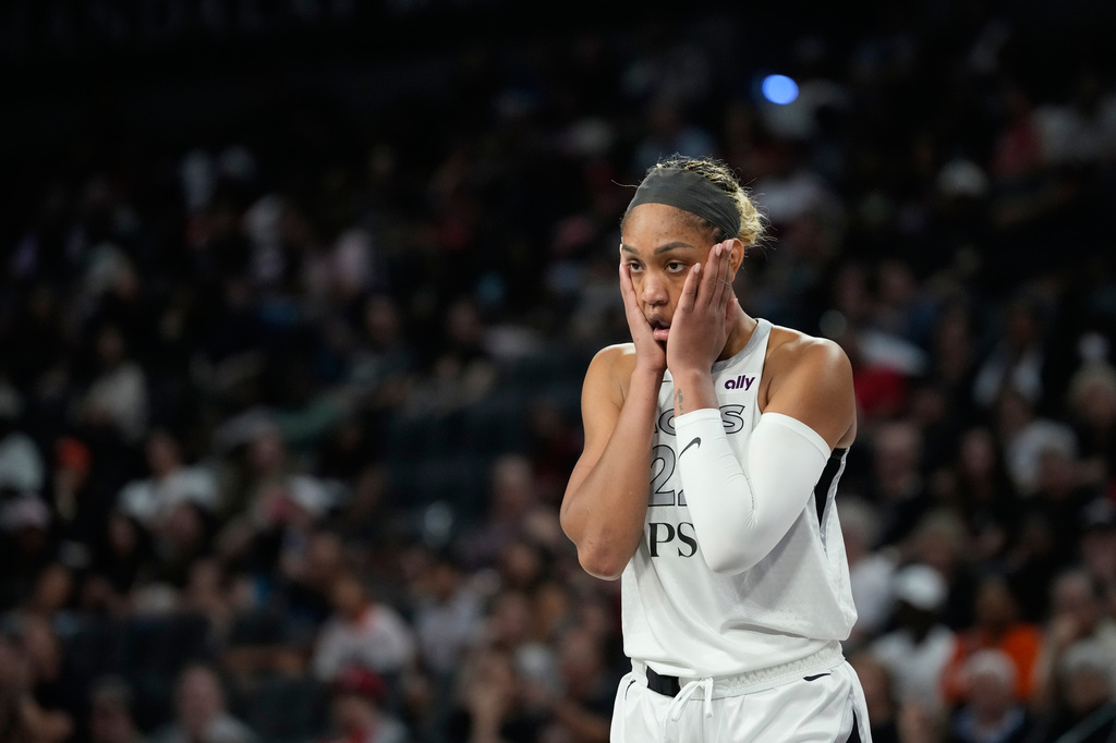 Las Vegas Aces forward Janiah Barker (2) reacts after a play against the Minnesota Lynx during the second half of a WNBA basketball game Saturday, June 13, 2026, in Las Vegas. (AP Photo/John Locher)