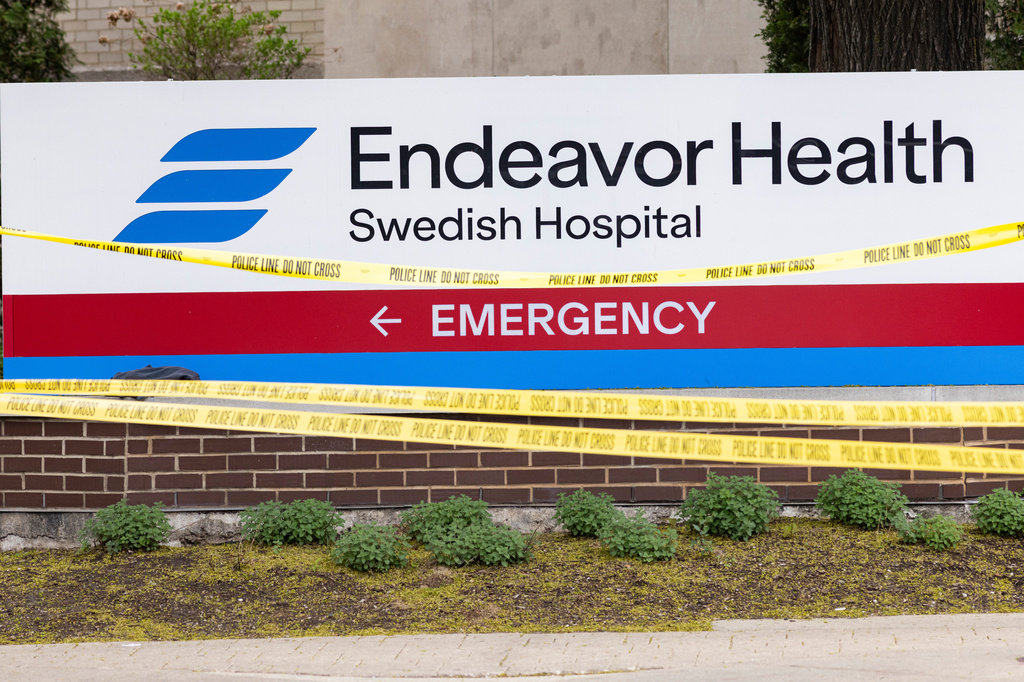 Tape covers the area outside of Endeavor Health Swedish Hospital in Chicago, Saturday, April 25, 2026, after a shooting. (Anthony Vazquez/Chicago Sun-Times via AP)