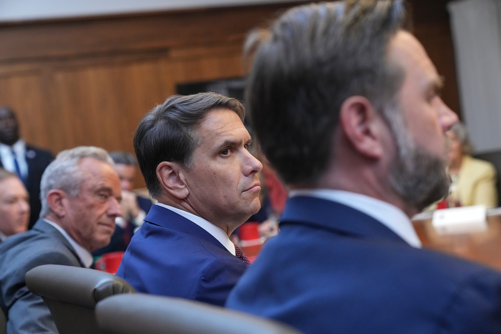 Health and Human Services Secretary Robert F. Kennedy Jr., from left, acting Attorney General Todd Blanche and Vice President JD Vance attend a cabinet meeting, Friday, July 31, 2026, at Camp David, the presidential retreat, near Thurmont, Md., Friday, July 31, 2026. (AP Photo/Jacquelyn Martin)