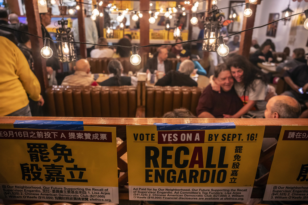 The room was decorated with campaign signs as supporters of Measure A campaign gathered to hear results of the measure to recall Supervisor Joel Engardio at Celia's restaurant in San Francisco, on Tuesday, Sept. 16, 2025. (Carlos Avila Gonzalez/San Francisco Chronicle via AP)
