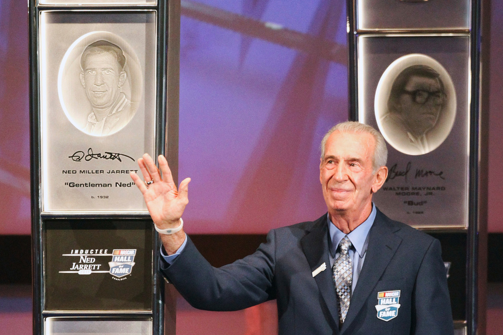 FILE - Ned Jarrett waves to the crowd after being inducted into the NASCAR Hall of Fame in Charlotte, N.C., Monday, May 23, 2011. (AP Photo/Terry Renna, File)