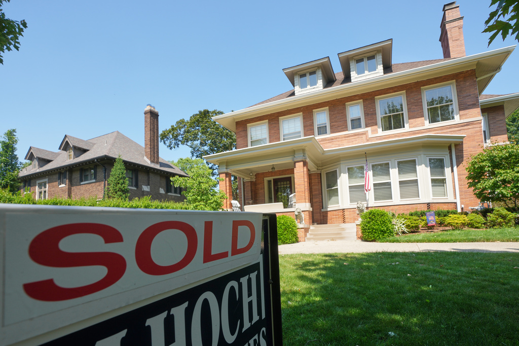 An existing home is shown sold Tuesday, July 7, 2026, in Grosse Pointe Park, Mich. (AP Photo/Paul Sancya)