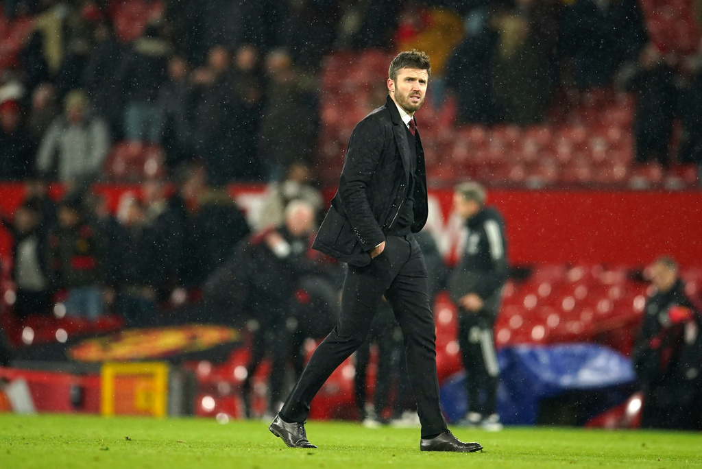 FILE - Manchester United's temporary coach Michael Carrick walks off the pitch at the end of the English Premier League soccer match between Manchester United and Arsenal at Old Trafford stadium in Manchester, England, Thursday, Dec. 2, 2021. (AP Photo/Dave Thompson, File)