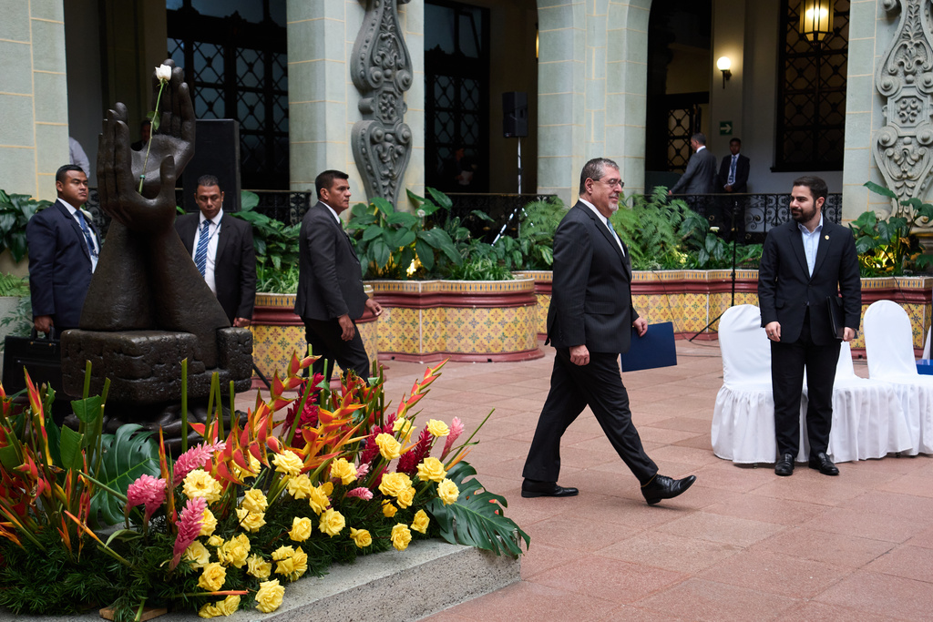 Guatemalan President Bernardo Arévalo arrives at a press conference about Barrio 18 gang members who escaped a maximum-security prison a week prior, in Guatemala City, Tuesday, Oct. 21, 2025. (AP Photo/Moises Castillo)