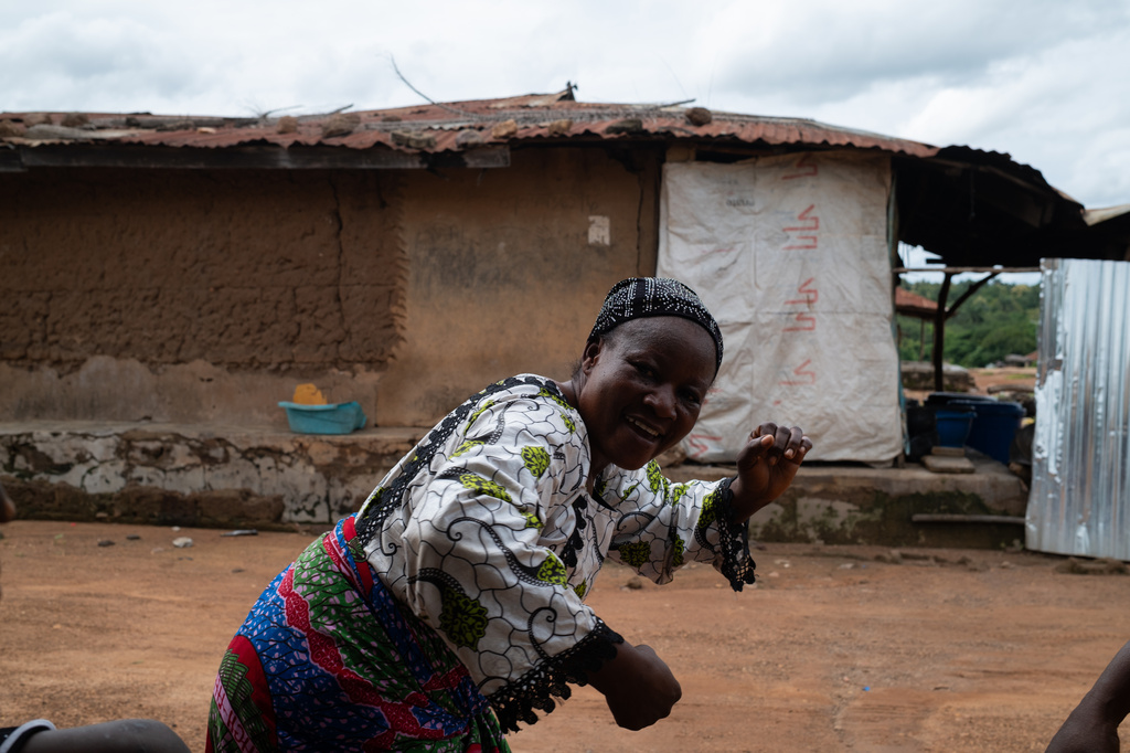 Aduke Balogun mother of Kehinde Kaosarat, a student that was kidnapped with others from a school by al-Qaida-linked fighters dances after she was released in Esinele, Southwestern, Nigeria, July 17, 2026. (AP Photo/Pelumi Salako)