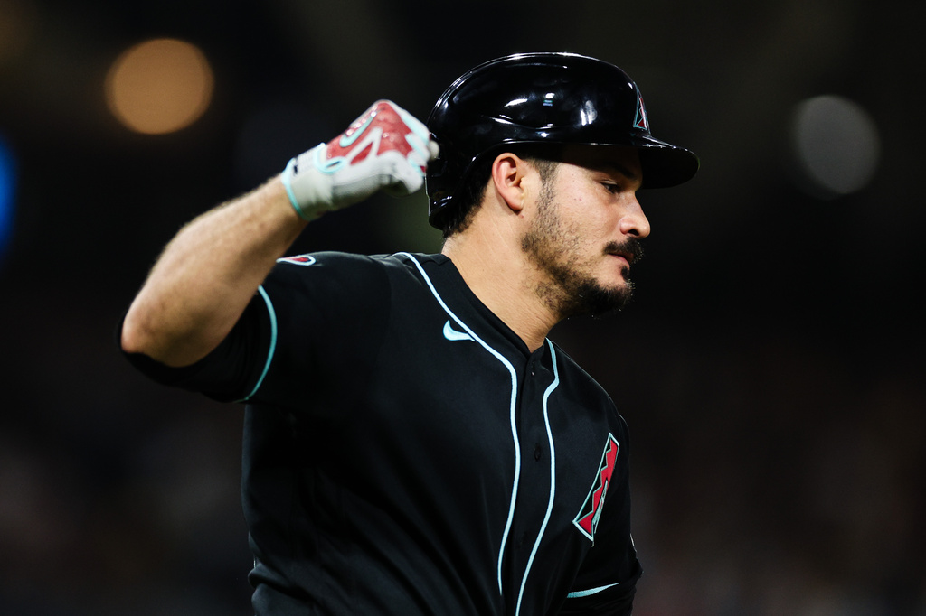 Arizona Diamondbacks' Nolan Arenado celebrates as he runs the bases after hitting a solo home run against the San Diego Padres in the sixth inning of a baseball game Thursday, July 9, 2026, in San Diego. (AP Photo/Derrick Tuskan)