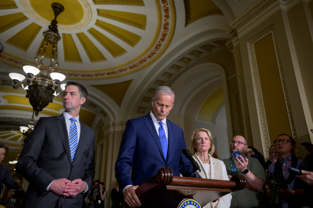 Senate Majority Leader John Thune, R-S.D., center, is joined by Sen. Tom Cotton, R-Ark., left, and Sen. Shelley Moore Capito, R-W.Va., right, during the Senate Republican policy luncheon news conference at the Capitol, Tuesday, May 19, 2026, in Washington. (AP Photo/Rod Lamkey, Jr.)