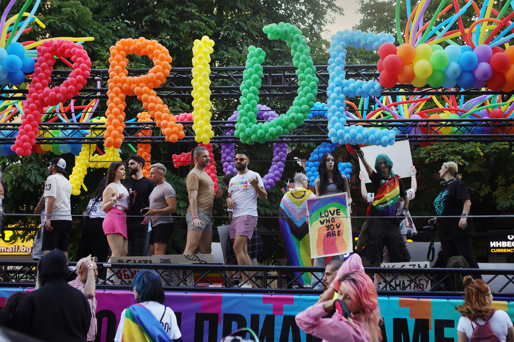 People dance during Pride Parade, in Sofia, Bulgaria, Saturday, June 13, 2026. (AP Photo/Valentina Petrova)